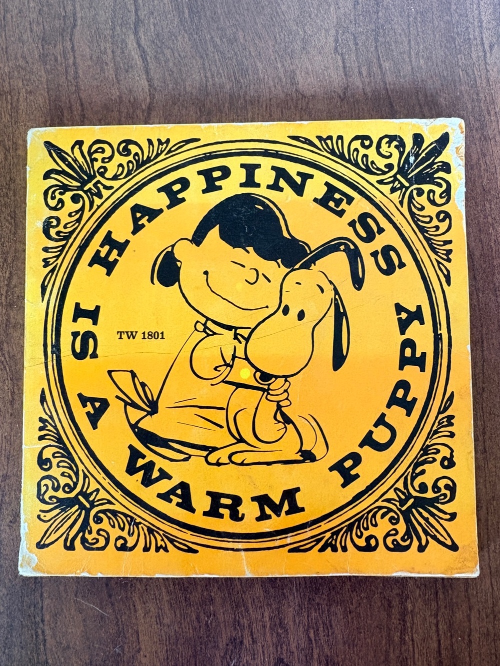 Vintage Peanuts Paperback book “Happiness is a Warm Puppy” by Charles M. Schulz